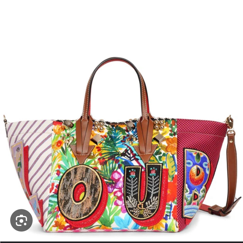 Christian Louboutin Bag, can be buckle to a bucket bag. Worn only 3xs